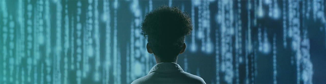 Image of a child staring at digital lines of code